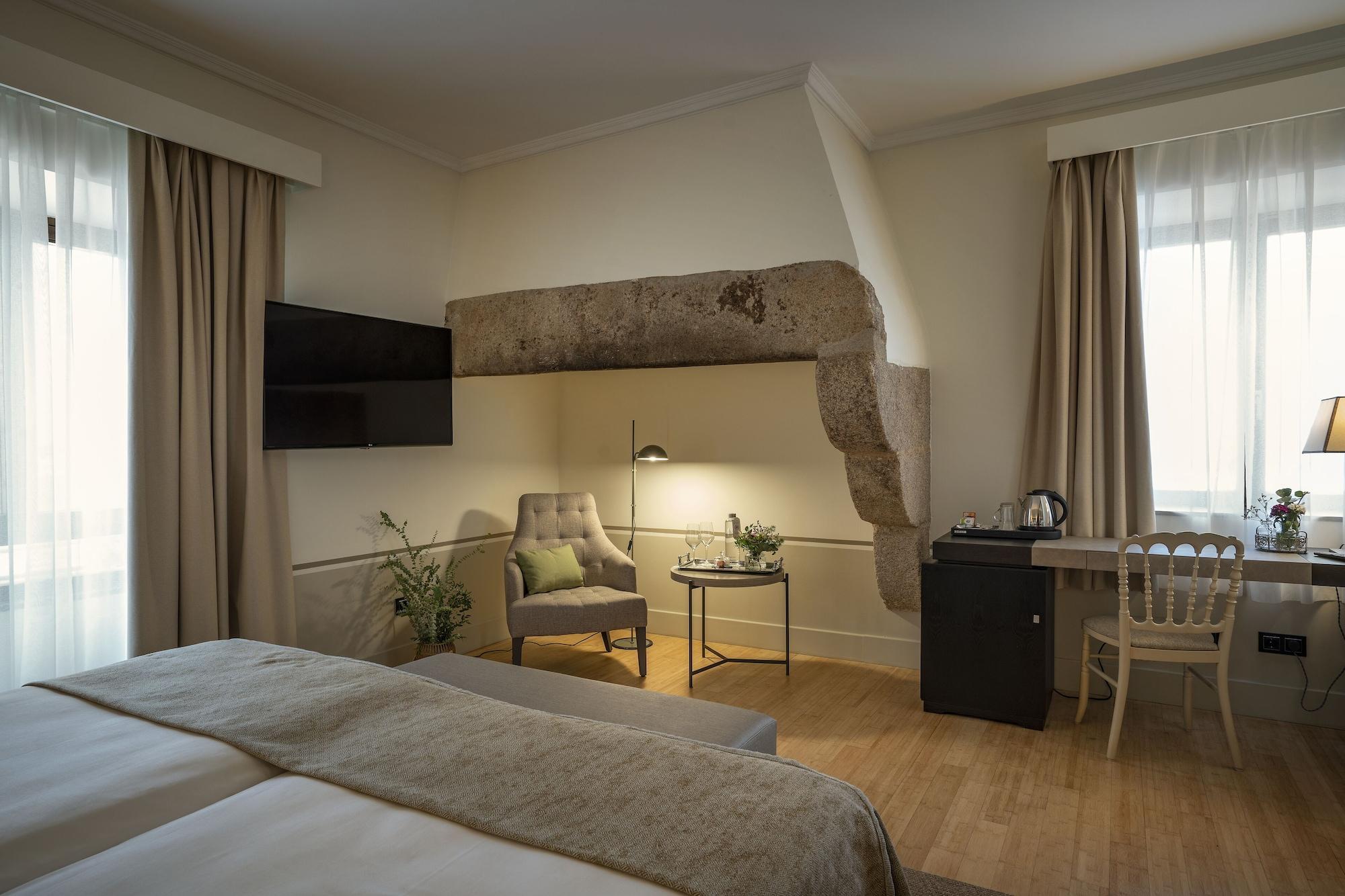 Hospes Palacio De Arenales & Spa Caceres Exterior photo A room at the hotel
